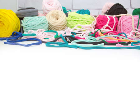 Background of multi-colored balls of yarn and thread