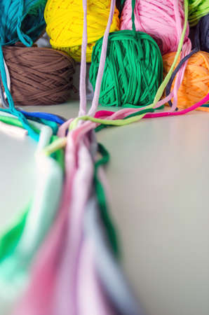 Background of multi-colored balls of yarn and threadの写真素材