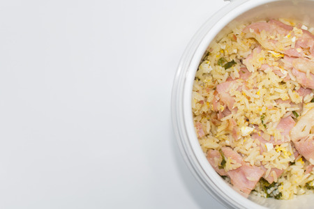 Fried rice in tiffin isolate on white backgroundの写真素材