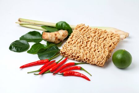 Dry noodle whit some seasoning  chilli,  lemon, ginger, kaffir lime leaf, lemongrass の写真素材