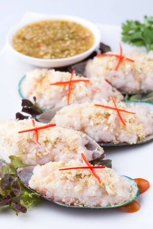 mixed and cooked seafood Ex  fish, shellfish, prawn, squid on shellsの写真素材