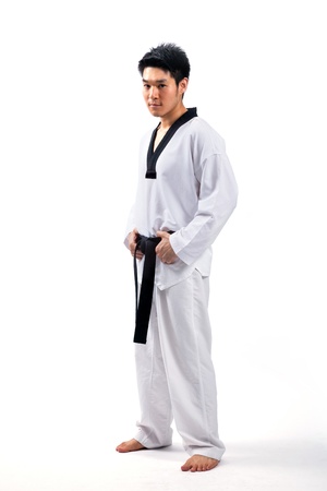 taekwondo action isolated by a young manの写真素材