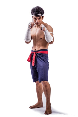 a thai boxer with thai boxing actionの写真素材