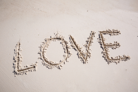 write wording love on the beachの写真素材