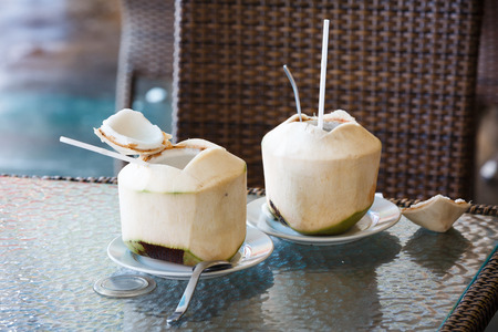 fresh coconut serve on the tableの写真素材
