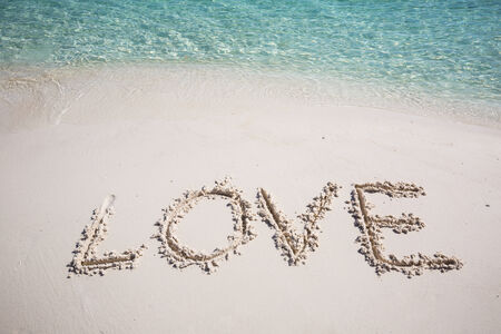 write wording love on the beachの写真素材