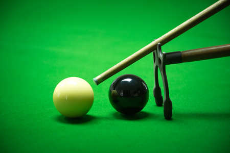 snooker balls set on a green tableの写真素材