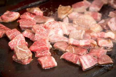 some meat be cooked on a hot panの写真素材