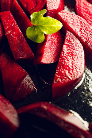 Freshly sliced beetroot with oil. Ready for cooking.の写真素材