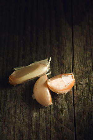 Macro photo of Organic garlic on a wooden tableの写真素材