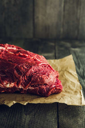 Fresh red Raw meat on a wooden backgroundの写真素材
