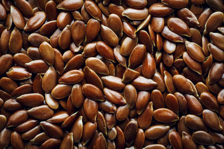 Macro background texture of Flax seeds. Top view.