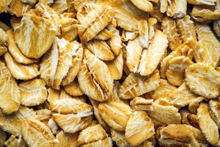 Oat flakes macro background texture. Top viewの写真素材