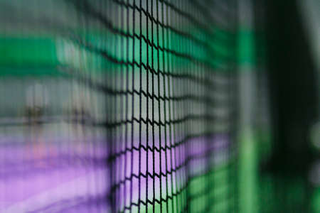 Soft focus close-up photo of indoor Tennis Netの写真素材