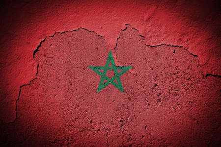 Morocco flag painted on grungy cracked wall
