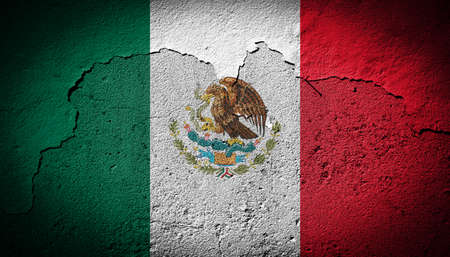 Mexico flag painted on grungy cracked wallの写真素材