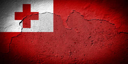 Tonga flag painted on grungy cracked wallの写真素材