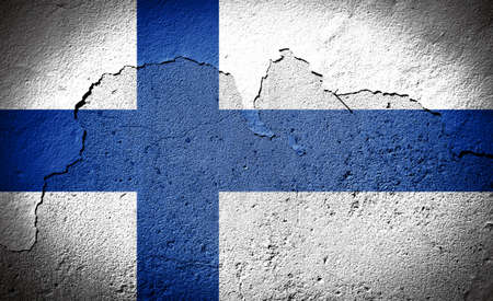 Finland flag painted on grungy cracked wallの写真素材