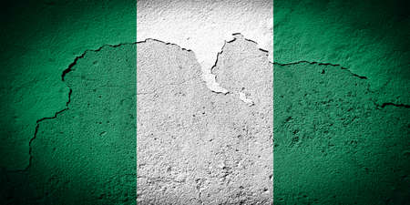 Nigeria flag painted on grungy cracked wallの写真素材