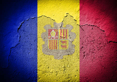 Andorra flag painted on grungy cracked wall