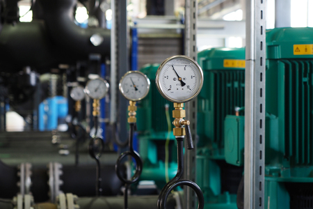 Line of manometers and valves in boiler room