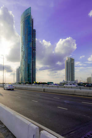 Skyscaper with blue sky and some ray light in backgroud