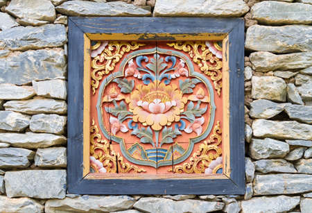 lotus carve on a rock wallの写真素材