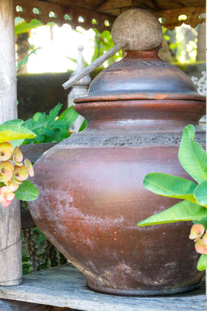 wooden dipper and a jarの写真素材