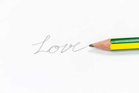 write love on a paperの写真素材