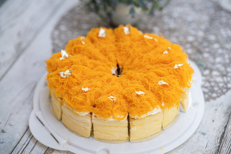 Egg Yolk Thread Cake decorate with gold leaf