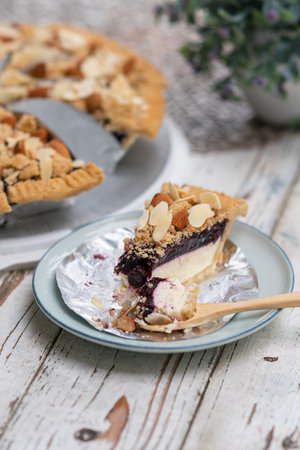 piece of slice cheese pie on a white deskの写真素材