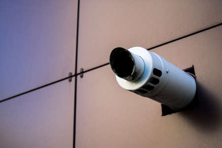 round sticking out of the wall ductの写真素材