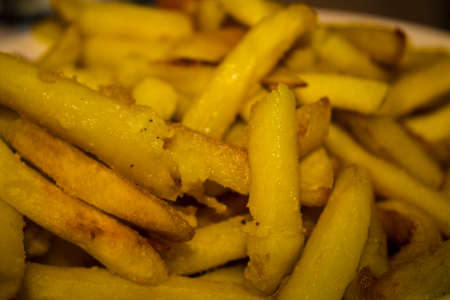 mouthwatering Golden fries in the middle view