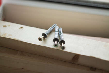 the dowels lying on a wooden Board