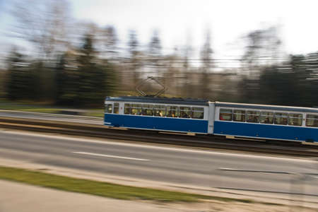Street tram rushing on thier way on Krakow street in motion blurのeditorial素材