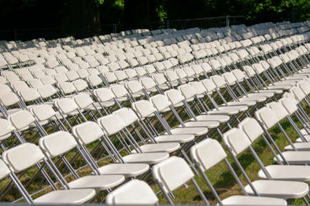 White plastic chairs set for an outdoor eventの写真素材