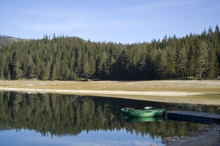 Two boats on the mole of the lakeの写真素材