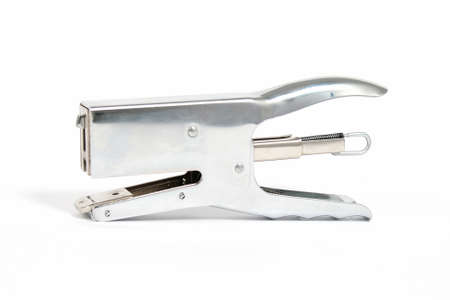 Silver stapler on a white backgroundの写真素材