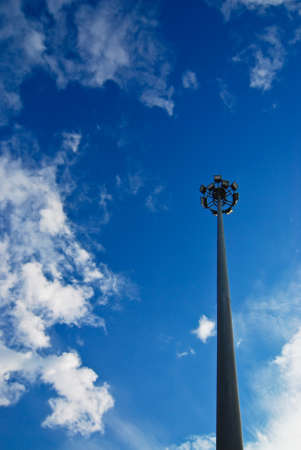 Street light pole on blue sky background
