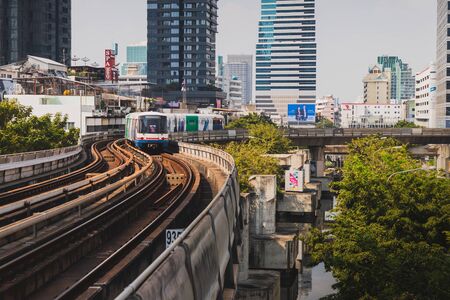 Bangkok, Thailand - January 12, 2019 :BTS Sky train mass transit system in Bangkok arrives to the station in the evening timeのeditorial素材
