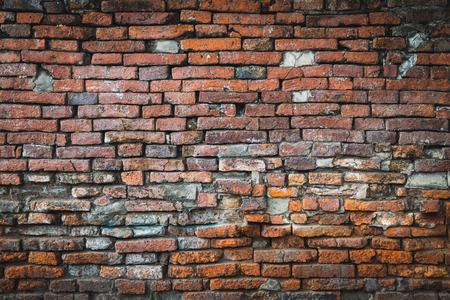 old orange brick wall background and the repair