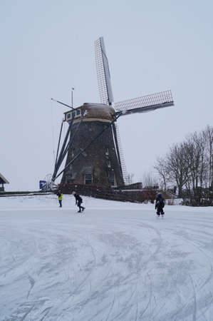 The windmill of Zwammerdam at the icesrinkの写真素材