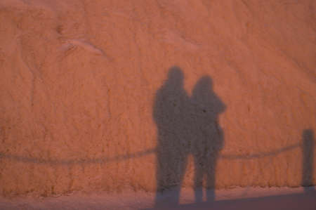 The shadow of a couple at duskの写真素材