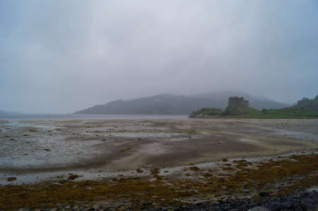 View of Castle Tioram and loch Moidart at low tideの写真素材