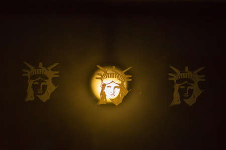 Logo of the Statue of Liberty on a windowの写真素材