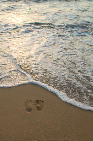 Footprints on the beach in hawaiiの写真素材