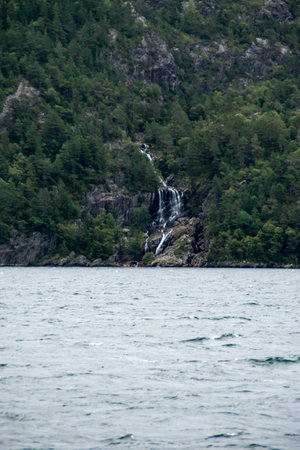 a waterfall in the Lysefjord in norwayの写真素材