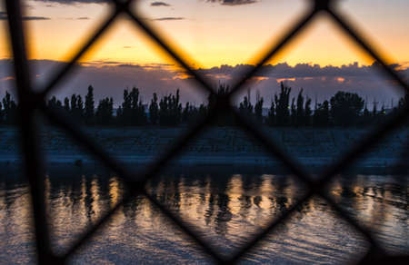 Sunset bright sky mountain, river South moodの写真素材