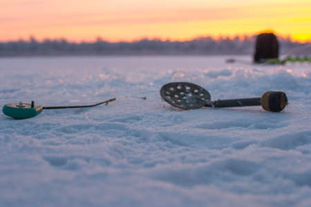 winter sport, winter fishing fishing outside on the iceの写真素材