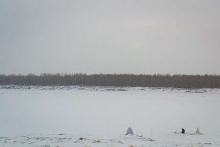 fishing on a large river in winter the river Ob Nizhnevartovskの写真素材